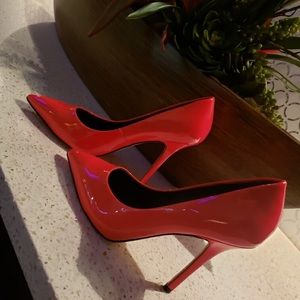 Neon pink stilettos.